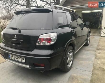 Чорний Міцубісі Аутлендер, об'ємом двигуна 2.38 л та пробігом 207 тис. км за 7000 $, фото 7 на Automoto.ua