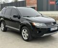 Черный Мицубиси Аутлендер, объемом двигателя 3 л и пробегом 248 тыс. км за 9800 $, фото 1 на Automoto.ua