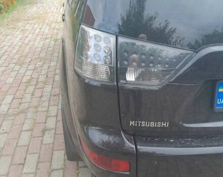 Чорний Міцубісі Аутлендер, об'ємом двигуна 2.36 л та пробігом 252 тис. км за 8900 $, фото 4 на Automoto.ua