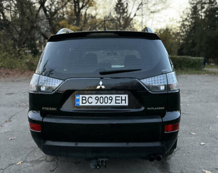 Чорний Міцубісі Аутлендер, об'ємом двигуна 1.97 л та пробігом 300 тис. км за 8600 $, фото 4 на Automoto.ua