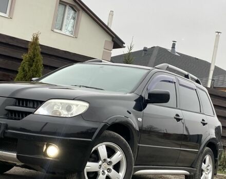 Черный Мицубиси Аутлендер, объемом двигателя 2.4 л и пробегом 178 тыс. км за 6900 $, фото 10 на Automoto.ua