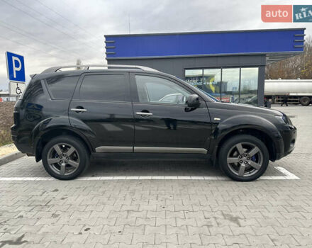 Чорний Міцубісі Аутлендер, об'ємом двигуна 2.4 л та пробігом 218 тис. км за 10000 $, фото 7 на Automoto.ua