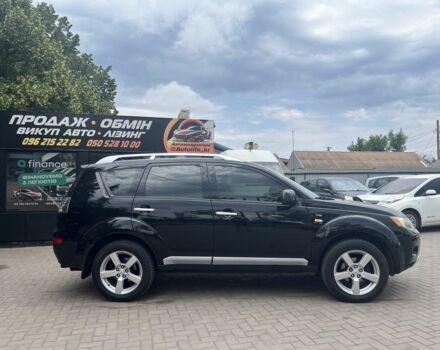 Черный Мицубиси Аутлендер, объемом двигателя 3 л и пробегом 235 тыс. км за 9800 $, фото 2 на Automoto.ua