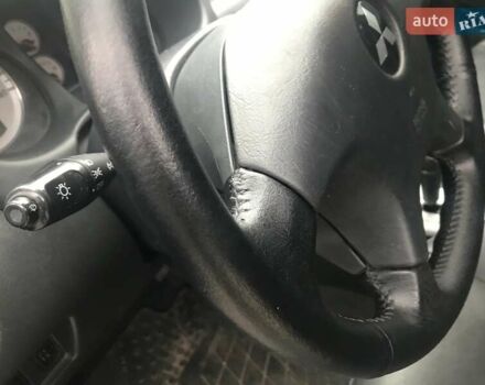 Чорний Міцубісі Аутлендер, об'ємом двигуна 2.38 л та пробігом 207 тис. км за 7000 $, фото 16 на Automoto.ua