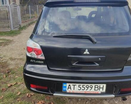 Міцубісі Аутлендер 2008 у Івано-Франківську на Automoto.ua Чорний Міцубісі Аутлендер, об'ємом двигуна 2 л та пробігом 128 тис. км за 7000 $, фото 3 на Automoto.ua
