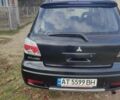 Міцубісі Аутлендер 2008 у Івано-Франківську на Automoto.ua Чорний Міцубісі Аутлендер, об'ємом двигуна 2 л та пробігом 128 тис. км за 7000 $, фото 3 на Automoto.ua
