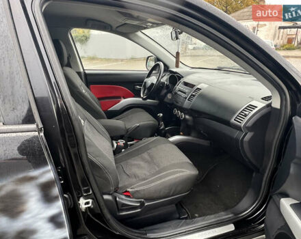 Міцубісі Аутлендер 2008 у Кременчуге на Automoto.ua Чорний Міцубісі Аутлендер, об'ємом двигуна 2.4 л та пробігом 230 тис. км за 6650 $, фото 48 на Automoto.ua