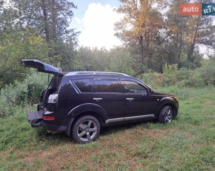 Черный Мицубиси Аутлендер, объемом двигателя 2.36 л и пробегом 245 тыс. км за 9200 $, фото 8 на Automoto.ua