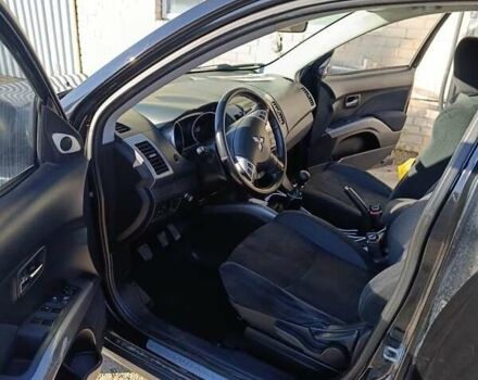 Черный Мицубиси Аутлендер, объемом двигателя 2.2 л и пробегом 200 тыс. км за 9500 $, фото 6 на Automoto.ua