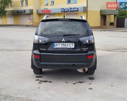Чорний Міцубісі Аутлендер, об'ємом двигуна 2.4 л та пробігом 205 тис. км за 8400 $, фото 5 на Automoto.ua