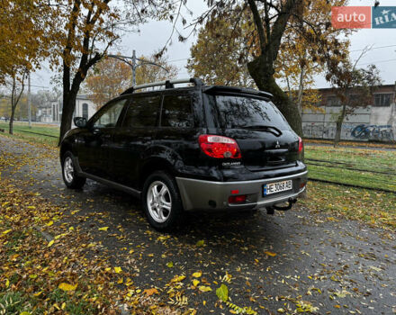 Чорний Міцубісі Аутлендер, об'ємом двигуна 2 л та пробігом 254 тис. км за 7499 $, фото 7 на Automoto.ua