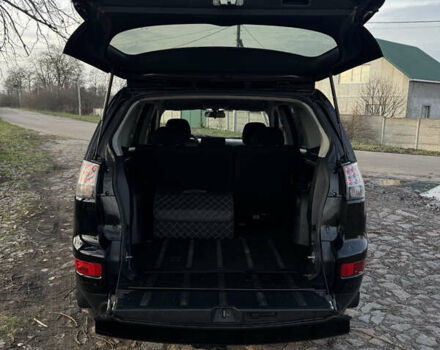 Чорний Міцубісі Аутлендер, об'ємом двигуна 2.36 л та пробігом 293 тис. км за 7900 $, фото 24 на Automoto.ua