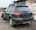 Черный Мицубиси Аутлендер, объемом двигателя 2 л и пробегом 200 тыс. км за 2999 $, фото 3 на Automoto.ua
