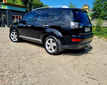 Черный Мицубиси Аутлендер, объемом двигателя 2.4 л и пробегом 234 тыс. км за 9800 $, фото 2 на Automoto.ua