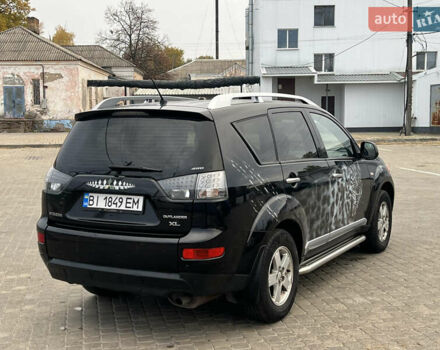 Мицубиси Аутлендер 2008 в Кременчуге на Automoto.ua Черный Мицубиси Аутлендер, объемом двигателя 2.4 л и пробегом 230 тыс. км за 6850 $, фото 12 на Automoto.ua