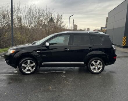 Черный Мицубиси Аутлендер, объемом двигателя 2 л и пробегом 320 тыс. км за 4800 $, фото 2 на Automoto.ua