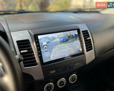 Чорний Міцубісі Аутлендер, об'ємом двигуна 2.4 л та пробігом 221 тис. км за 8900 $, фото 21 на Automoto.ua