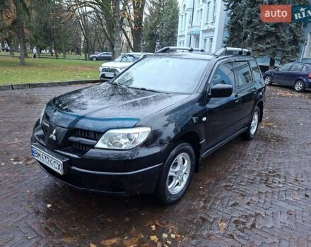 Чорний Міцубісі Аутлендер, об'ємом двигуна 2 л та пробігом 191 тис. км за 7100 $, фото 7 на Automoto.ua