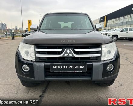 Черный Мицубиси Аутлендер, объемом двигателя 3 л и пробегом 218 тыс. км за 11950 $, фото 1 на Automoto.ua