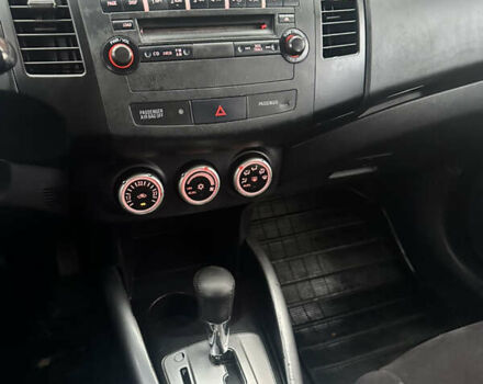 Черный Мицубиси Аутлендер, объемом двигателя 2.4 л и пробегом 199 тыс. км за 8777 $, фото 12 на Automoto.ua