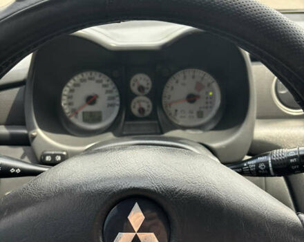 Мицубиси Аутлендер 2008 в Днепре (Днепропетровске) на Automoto.ua Черный Мицубиси Аутлендер, объемом двигателя 2.38 л и пробегом 320 тыс. км за 7500 $, фото 16 на Automoto.ua