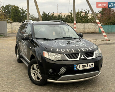 Черный Мицубиси Аутлендер, объемом двигателя 2.4 л и пробегом 230 тыс. км за 6650 $, фото 3 на Automoto.ua