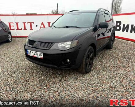 Черный Мицубиси Аутлендер, объемом двигателя 2.4 л и пробегом 200 тыс. км за 9999 $, фото 2 на Automoto.ua