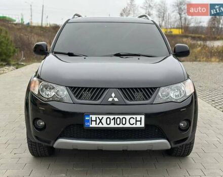 Черный Мицубиси Аутлендер, объемом двигателя 3 л и пробегом 248 тыс. км за 9800 $, фото 1 на Automoto.ua