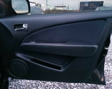 Черный Мицубиси Аутлендер, объемом двигателя 2 л и пробегом 271 тыс. км за 6940 $, фото 20 на Automoto.ua