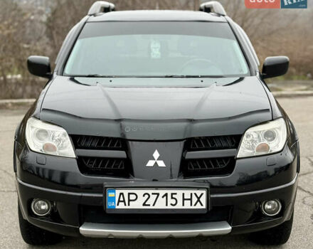 Черный Мицубиси Аутлендер, объемом двигателя 2.4 л и пробегом 245 тыс. км за 6500 $, фото 3 на Automoto.ua