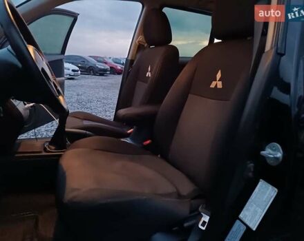 Чорний Міцубісі Аутлендер, об'ємом двигуна 2 л та пробігом 271 тис. км за 6940 $, фото 29 на Automoto.ua