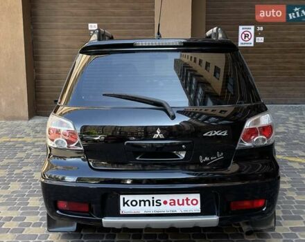 Черный Мицубиси Аутлендер, объемом двигателя 2 л и пробегом 270 тыс. км за 7199 $, фото 18 на Automoto.ua