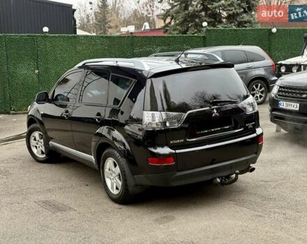 Черный Мицубиси Аутлендер, объемом двигателя 2.4 л и пробегом 185 тыс. км за 7900 $, фото 2 на Automoto.ua