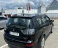 Чорний Міцубісі Аутлендер, об'ємом двигуна 2.4 л та пробігом 137 тис. км за 8999 $, фото 3 на Automoto.ua