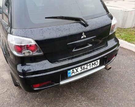 Мицубиси Аутлендер 2008 в Изюме на Automoto.ua Черный Мицубиси Аутлендер, объемом двигателя 2 л и пробегом 270 тыс. км за 7200 $, фото 6 на Automoto.ua