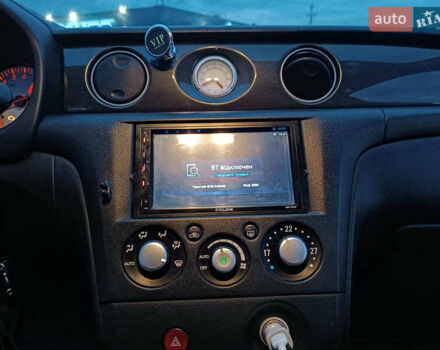 Чорний Міцубісі Аутлендер, об'ємом двигуна 2 л та пробігом 271 тис. км за 6940 $, фото 26 на Automoto.ua