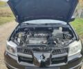 Міцубісі Аутлендер 2008 у Івано-Франківську на Automoto.ua Чорний Міцубісі Аутлендер, об'ємом двигуна 2 л та пробігом 128 тис. км за 7000 $, фото 6 на Automoto.ua