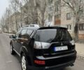 Черный Мицубиси Аутлендер, объемом двигателя 2 л и пробегом 377 тыс. км за 5200 $, фото 3 на Automoto.ua