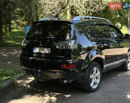Черный Мицубиси Аутлендер, объемом двигателя 1.97 л и пробегом 265 тыс. км за 9600 $, фото 6 на Automoto.ua