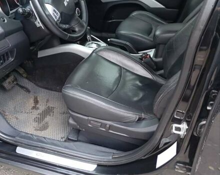 Чорний Міцубісі Аутлендер, об'ємом двигуна 2.36 л та пробігом 265 тис. км за 8800 $, фото 13 на Automoto.ua