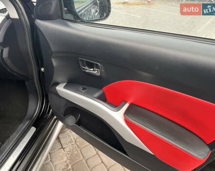 Черный Мицубиси Аутлендер, объемом двигателя 2.4 л и пробегом 230 тыс. км за 6650 $, фото 49 на Automoto.ua