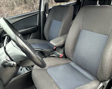 Чорний Міцубісі Аутлендер, об'ємом двигуна 2 л та пробігом 118 тис. км за 8100 $, фото 38 на Automoto.ua