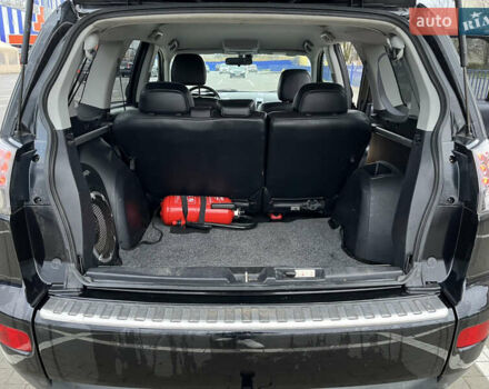 Черный Мицубиси Аутлендер, объемом двигателя 1.97 л и пробегом 244 тыс. км за 8700 $, фото 17 на Automoto.ua