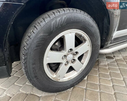 Черный Мицубиси Аутлендер, объемом двигателя 2.4 л и пробегом 230 тыс. км за 6650 $, фото 59 на Automoto.ua