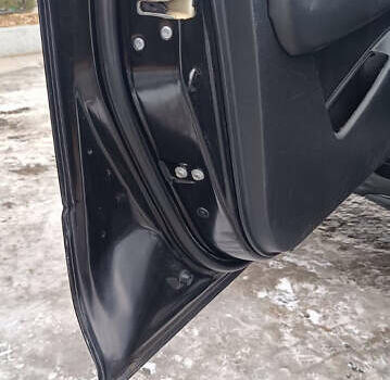 Мицубиси Аутлендер 2008 в Днепре (Днепропетровске) на Automoto.ua Черный Мицубиси Аутлендер, объемом двигателя 2.38 л и пробегом 320 тыс. км за 7500 $, фото 19 на Automoto.ua