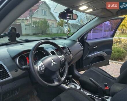 Черный Мицубиси Аутлендер, объемом двигателя 2.36 л и пробегом 192 тыс. км за 8800 $, фото 2 на Automoto.ua