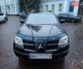 Чорний Міцубісі Аутлендер, об'ємом двигуна 2 л та пробігом 191 тис. км за 7100 $, фото 1 на Automoto.ua