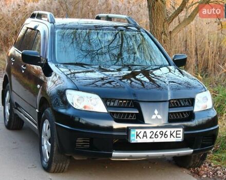 Черный Мицубиси Аутлендер, объемом двигателя 2 л и пробегом 189 тыс. км за 7200 $, фото 38 на Automoto.ua