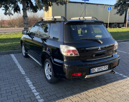Чорний Міцубісі Аутлендер, об'ємом двигуна 2 л та пробігом 218 тис. км за 6300 $, фото 5 на Automoto.ua