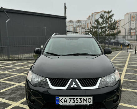 Черный Мицубиси Аутлендер, объемом двигателя 2.36 л и пробегом 120 тыс. км за 10100 $, фото 1 на Automoto.ua